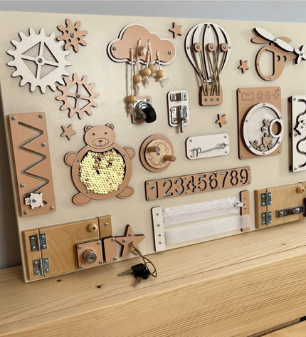 Montessori busy board with doors and locks (40×60 cm)