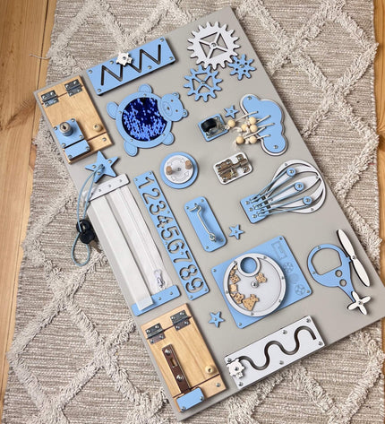 Montessori busy board with doors and locks (40×60 cm)